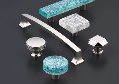 Elegant custom designer glass and metal hardware for luxury walk-in closets.