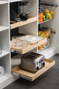 great ways to organize your kitchen pantry with pull out shelves and large baskets.
