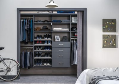 Men's customized walk-in closet designed and installed by Closet Solutions Chattanooga.